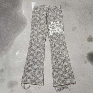 Tornado Mart Real History of Empire Darkness Flare Denim Pants